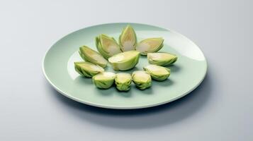 Photo of Artichoke slices on plate isolated on white background.