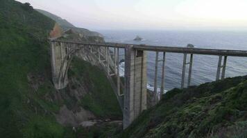 Bixby Creek Arch Bridge at Carmel By The Sea and Big Sur California Central Coast known for Winding Roads, Seaside Cliffs and Views of the Often Misty Coastline video