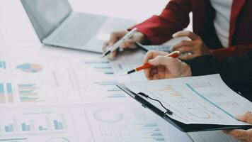 Team of business people working together in the meeting room office, teamwork background charts and graphs banner, double exposure successful teamwork,business planning concept. video