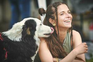Young girl with her inseparable Australian shepherd dog photo