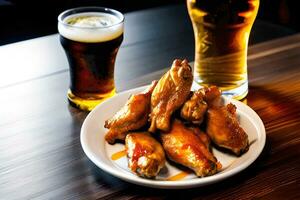 Grilled chicken wings with a glass of beer on a wooden table. AI Generative photo