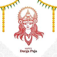 Goddess durga face in happy durga puja card background vector