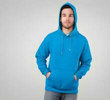 Young man wearing blank blue hoodie mockup print presentation mockup ai generate photo