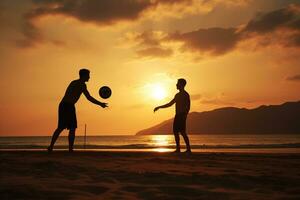 Male beach volleyball players play a volleyball match on the beach photo