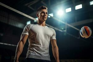 Male volleyball players are competing on the indoor volleyball court photo