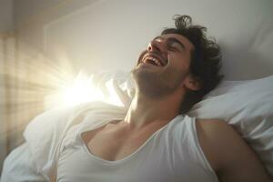 A man happily wakes up in white bedroom photo
