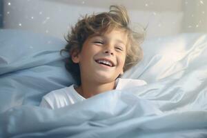 A boy happily wakes up in white bedroom photo