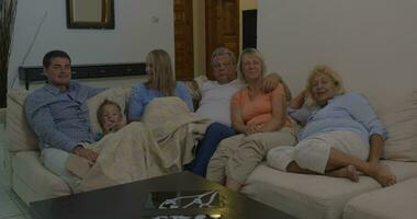 Big family watching TV in the evening video