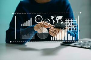 Data Management System with Business Analytics concept. business team hands working with provide information for Key Performance Indicators and marketing analysis onn virtual computer photo