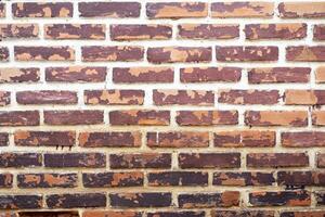 Old red brick wall background, wide panorama of masonry photo