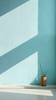 Minimal abstract light blue background for product presentation. Shadow and light from windows on plaster wall photo