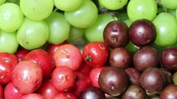 Ripe fruits collection with grapes for healthy diet plan on white background video