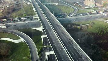 An aerial view of a busy road junction on a bright day video