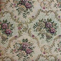 Beige fabric with floral pattern. Furniture jacquard fabric with flowers in geometric style. photo
