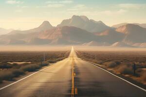 Straight road in the desert with mountain backdrop photo