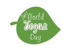 World Vegan Day. Frame in the form of a green leaf with handwritten calligraphic inscriptions. The concept of vegetarianism and diet food. Healthy lifestyle. Vector illustration. Isolated background.