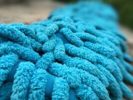 blue rag on a rope on a blur background photo