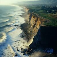 Coastal erosion. A coastline is eroded by powerful waves photo