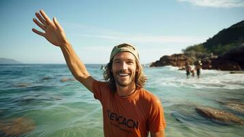 Ocean conservation. A man holds a save the ocean sign photo