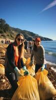 Beach cleanup. Volunteers collect trash on a sandy shore photo