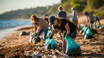 Beach cleanup. Volunteers collect trash on a sandy shore photo