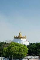 The Golden Mount Travel Landmark of Wat Saket Monastery at Bangkok of Thailand photo