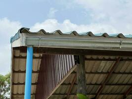 old metal roof with blue sky. photo