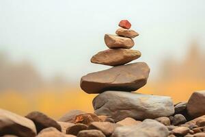 Stack of balanced rocks around pile of rocks. AI Generated. photo