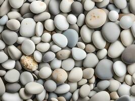 white and grey stones texture background. top view. photo