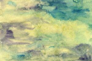 Yellow green-purple watercolor background texture photo