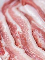 Closeup pieces of raw pork belly photo