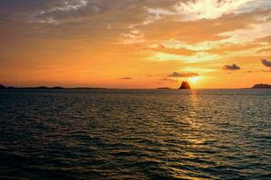 Sunset over the sea in Thailand photo