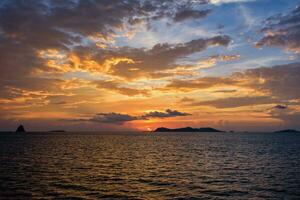 Sunset over the sea in Thailand photo