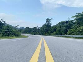 road asphalt in the forest nature countryside of Thailand. photo