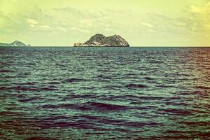 Small island in vintage style photo