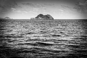 Small island in black and white photo