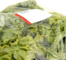 iceberg lettuce in plastic bag package photo
