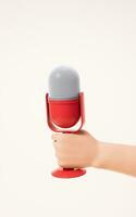 Microphone in a hand, 3d rendering. photo
