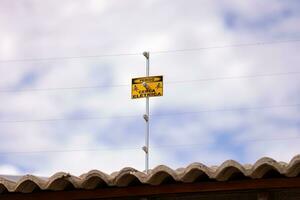 electric fence danger sign photo