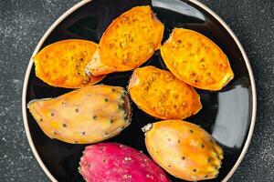 prickly pear exotic fruit figues de barbarie appetizer meal food snack on the table copy space photo