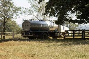 milk truck vehicle on a farm photo
