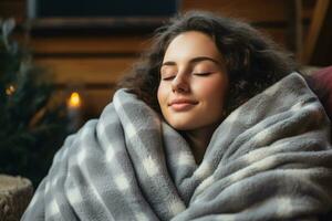 Person comfortably asleep with a heating pad combating an autumn cold photo