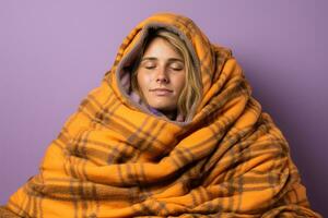 Individual bundled in blanket bracing against fall chill isolated on a gradient background photo
