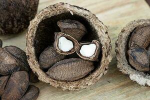 Brazil nuts on a board photo