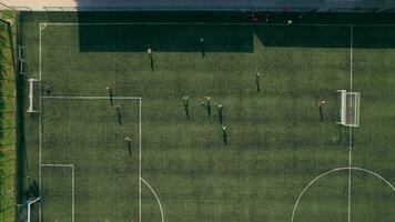 Aerial view from drone of football soccer field with players. 4k stock footage. video