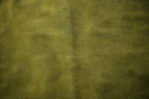 Vintage khaki green abstract background with olive mustard coloring fabric texture photo
