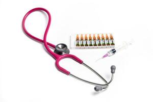 ampule syringe and stethoscope photo