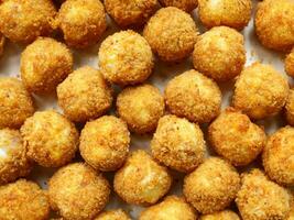 fried corn balls on the table photo