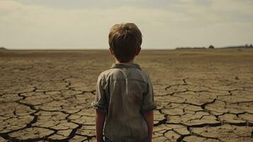 Lonely Boy Looking for Food on a Deserted Island photo