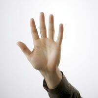 Celebrating Success Mans Hand Giving a High Five on White Background photo